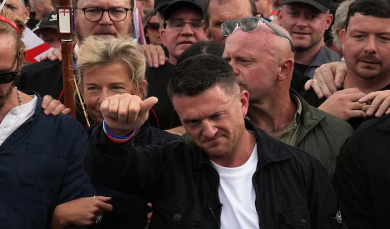 Tommy Robinson speaking ahead of Unite the Kingdom rally, central London, 16 May 2026, flags of England and United Kingdom visible in crowd, Metropolitan Police approved route. Tommy Robinson speaking ahead of Unite the Kingdom rally, central London, 16 May 2026, flags of England and United Kingdom visible in crowd, Metropolitan Police approved route.