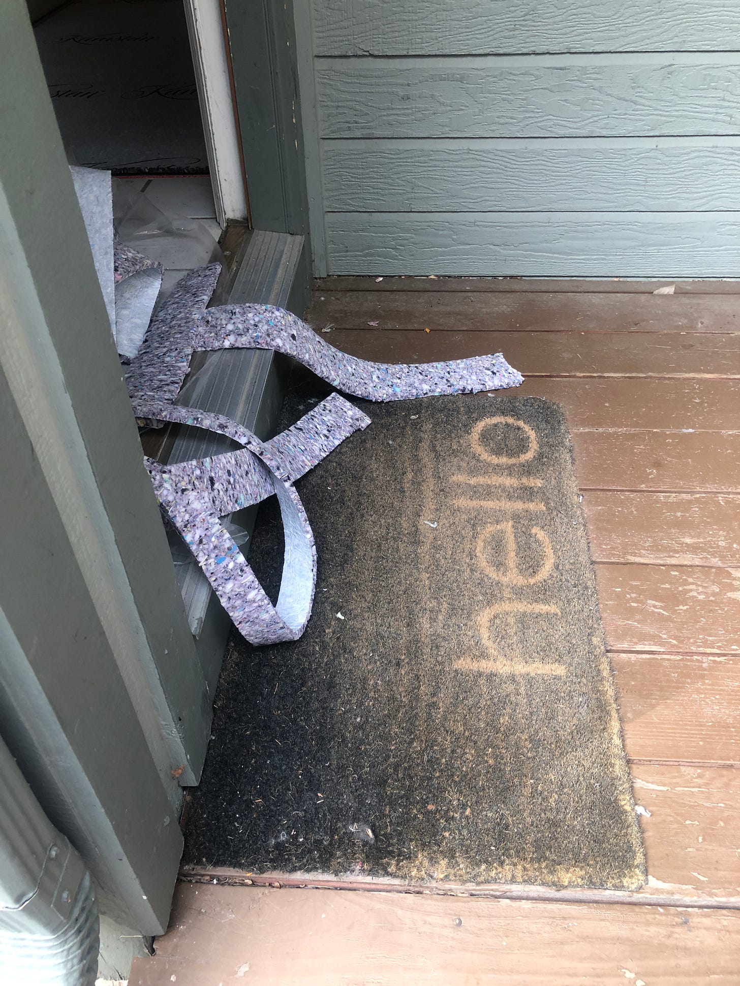 Picture of carpet padding at a door entrance 