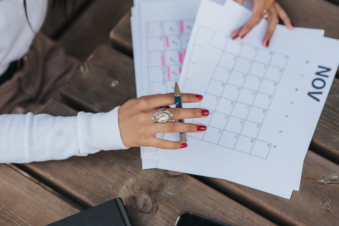 Person Wearing Silver Ring and White Long Sleeve Shirt Person Wearing Silver Ring and White Long Sleeve Shirt