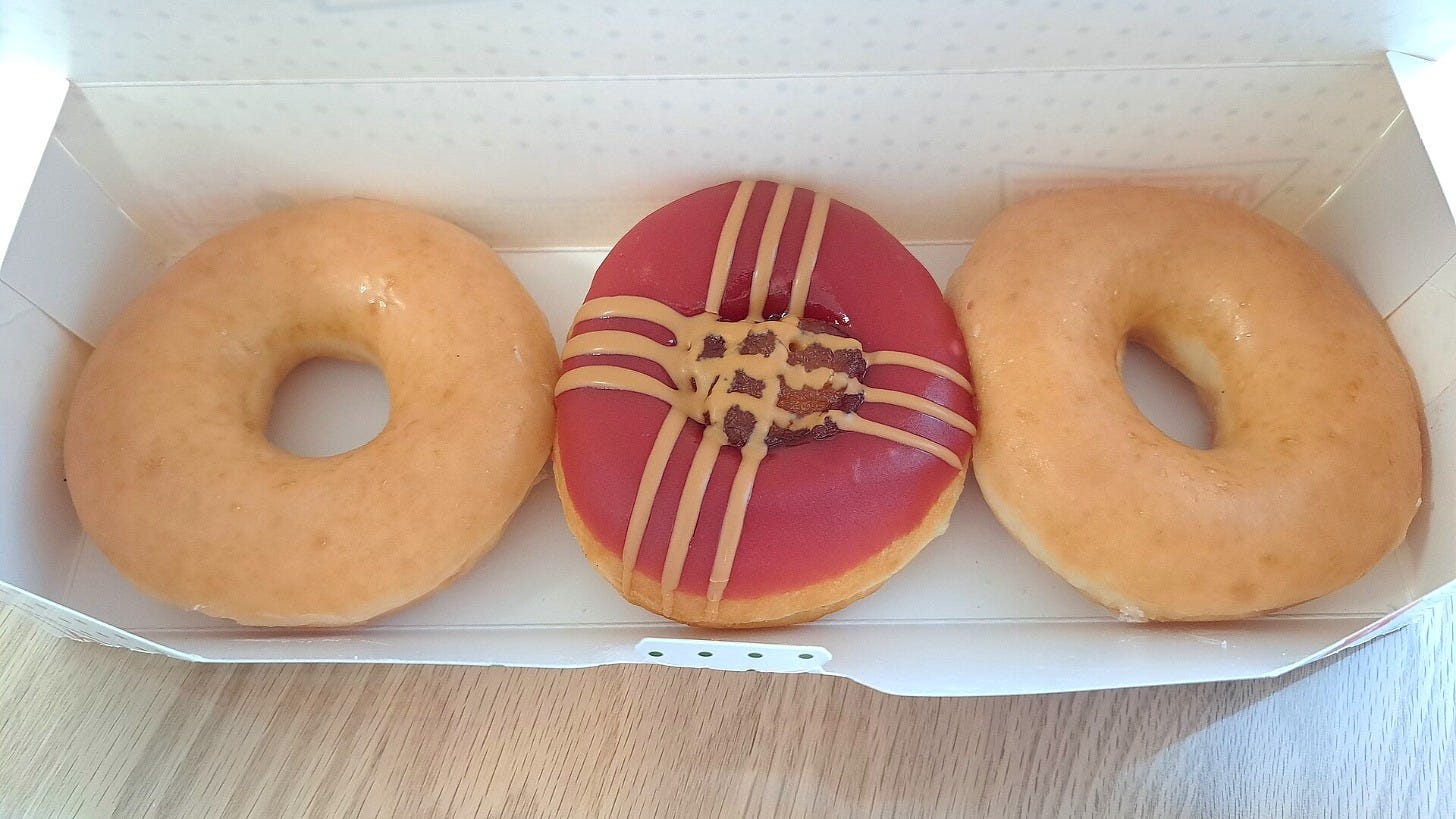 Krispy Kreme Original Glazed doughnuts in a box. Image: RuinDig/Yuki Uchida via Wikimedia Commons
