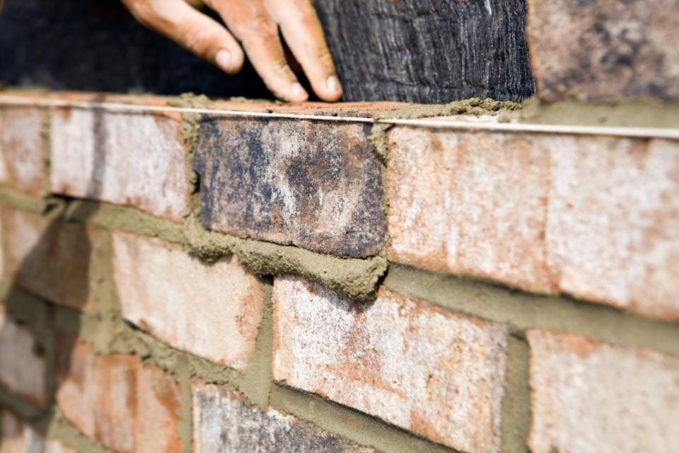 https://thegradient.pub/content/images/2021/10/brick-foundation-wall-photo.jpeg