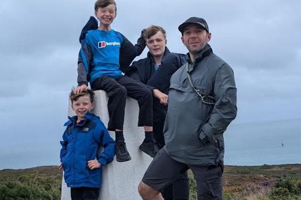 Andy Haines with his three sons Sam, 16, Isaac, 11 and eight-year-old Joshua
