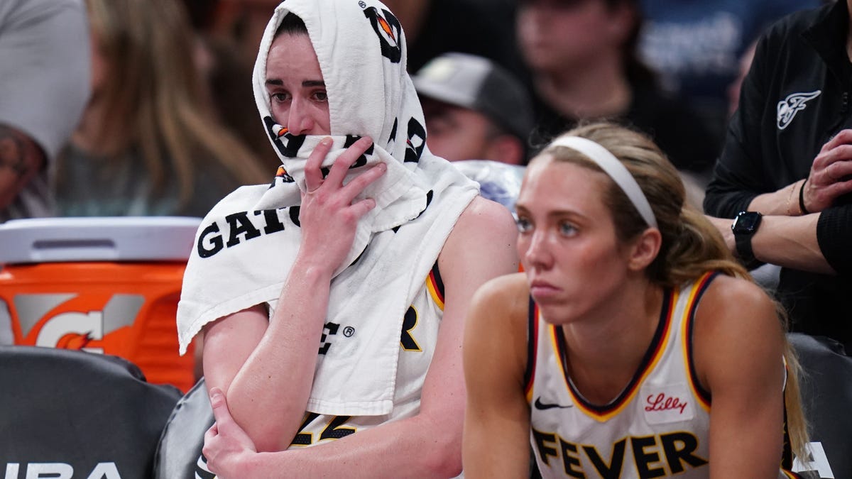Indiana Fever guard Caitlin Clark (22) hurt her right groin Tuesday against the Sun.