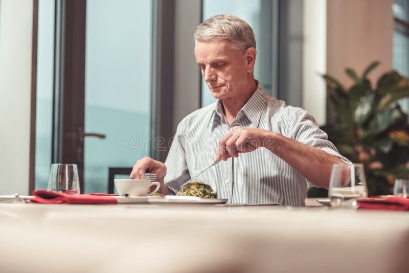 Pasted Graphic.jpg Man seems unhappy with his food.