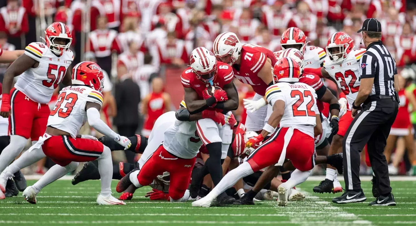 Wisconsin Badgers running back Darian Dupree is brought down by Maryland Terrapins defenders during a loss at Camp Randall Stadium. Wisconsin Badgers running back Darian Dupree is brought down by Maryland Terrapins defenders during a loss at Camp Randall Stadium.
