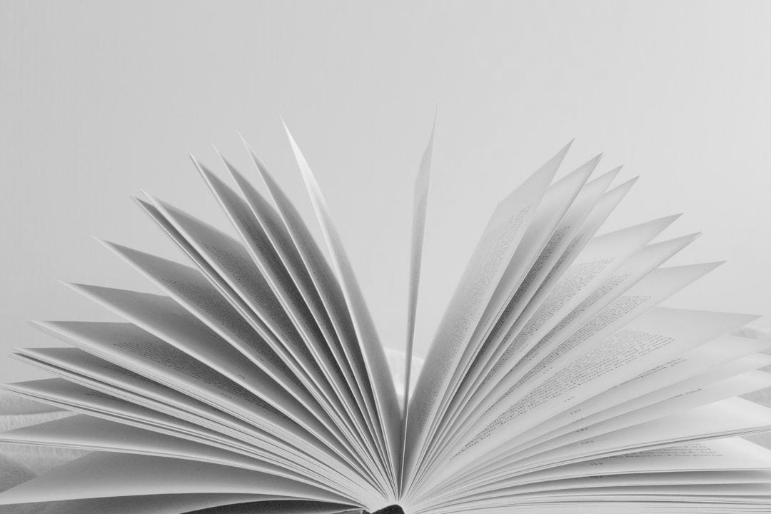 white book page with black background white book page with black background