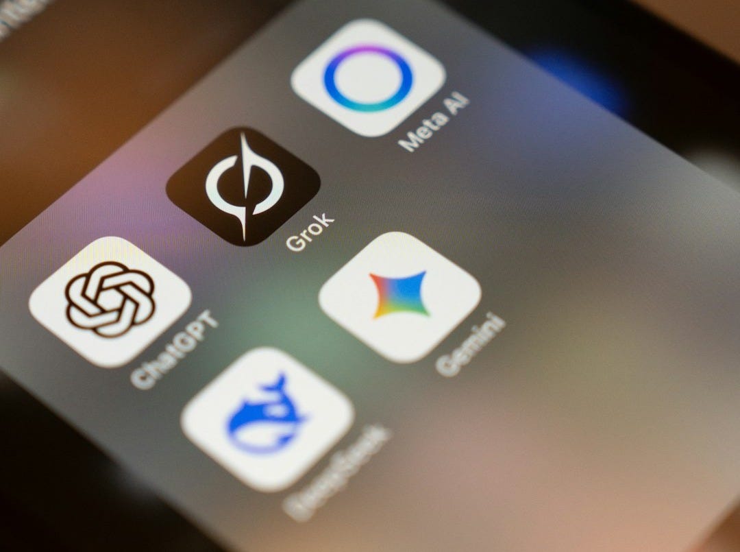 Smartphone screen displays ai app icons: chatgpt, grok, meta ai, gemini. Smartphone screen displays ai app icons: chatgpt, grok, meta ai, gemini.