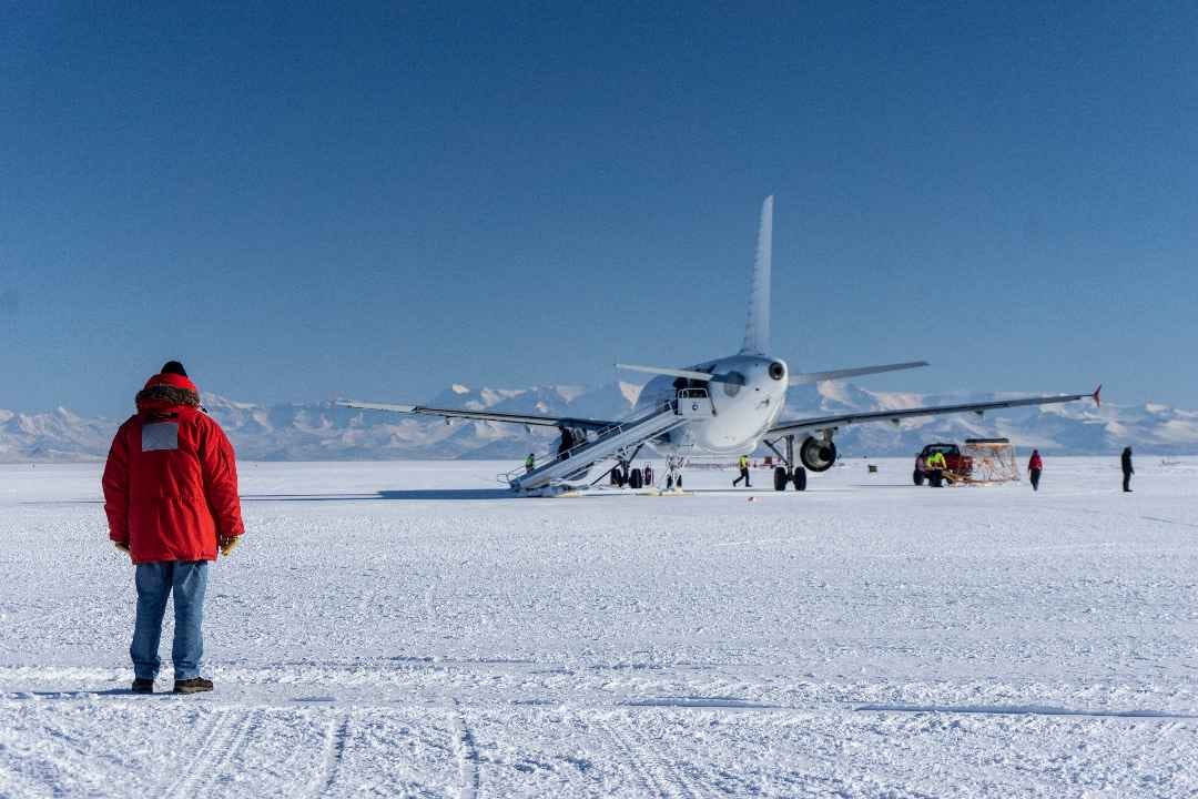 A National Science Foundation flight landing near Mcmurdo station in Antarctica . Copyright (c) 2019 Colin Harnish/Shutterstock.