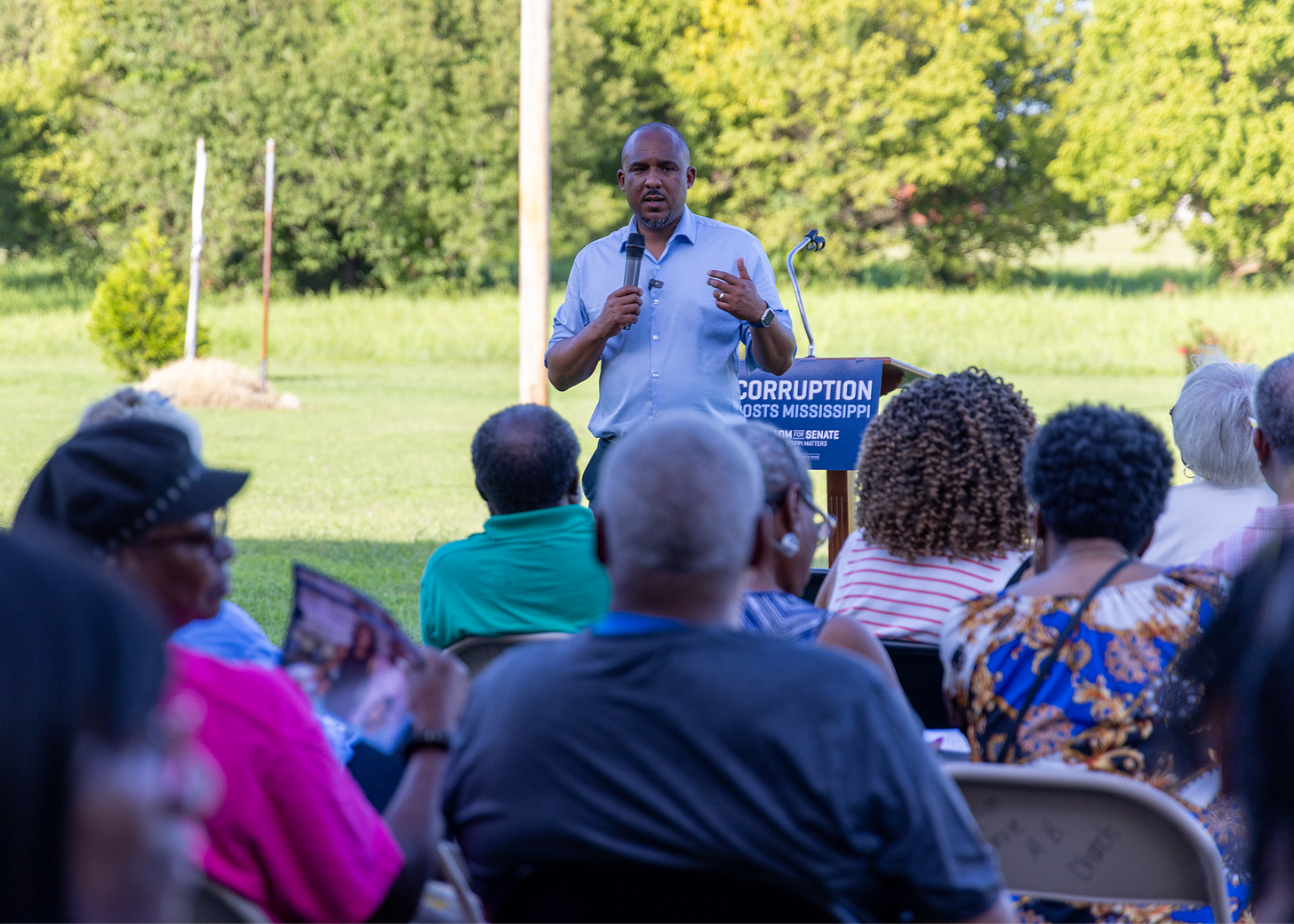 Scott, speaking in front of a crowd