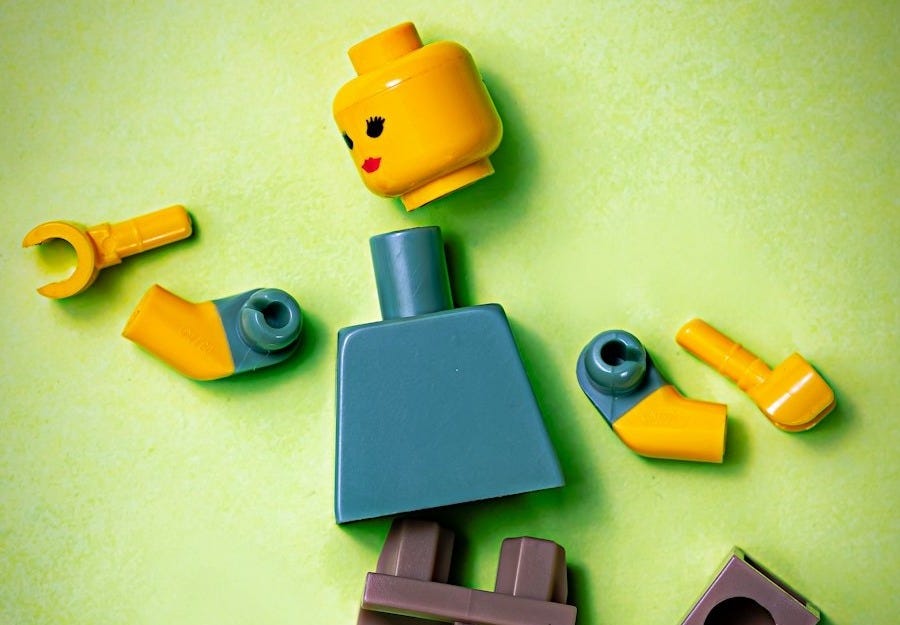blue orange green and yellow plastic toy blue orange green and yellow plastic toy