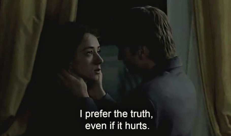 Screen shot of a scene from Chantal Akerman's film La Captive. A woman says to a man "I prefer the truth even if it hurts," while the man holds her face in his hands.