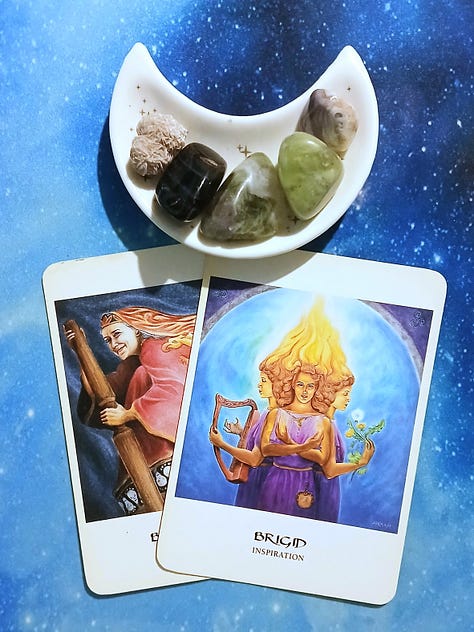 Goddess Oracle cards on a starry blue background: Baba Yaga & Briged