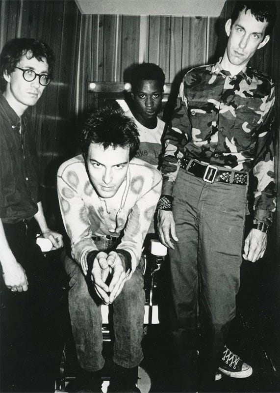 Four musicians posing. Four musicians posing.