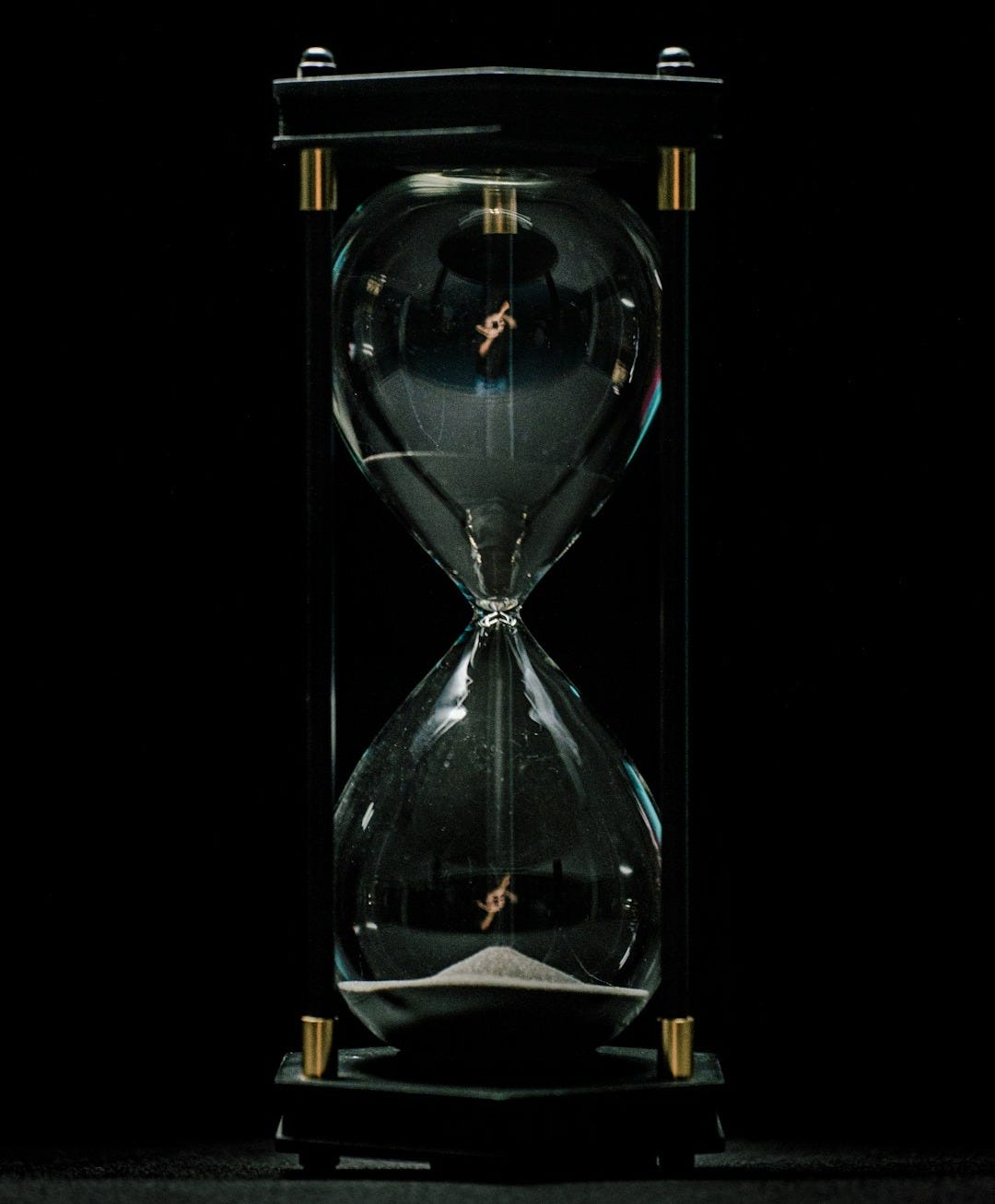 a glass with a liquid in it a glass with a liquid in it