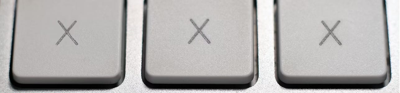 A close up of a key

Description automatically generated