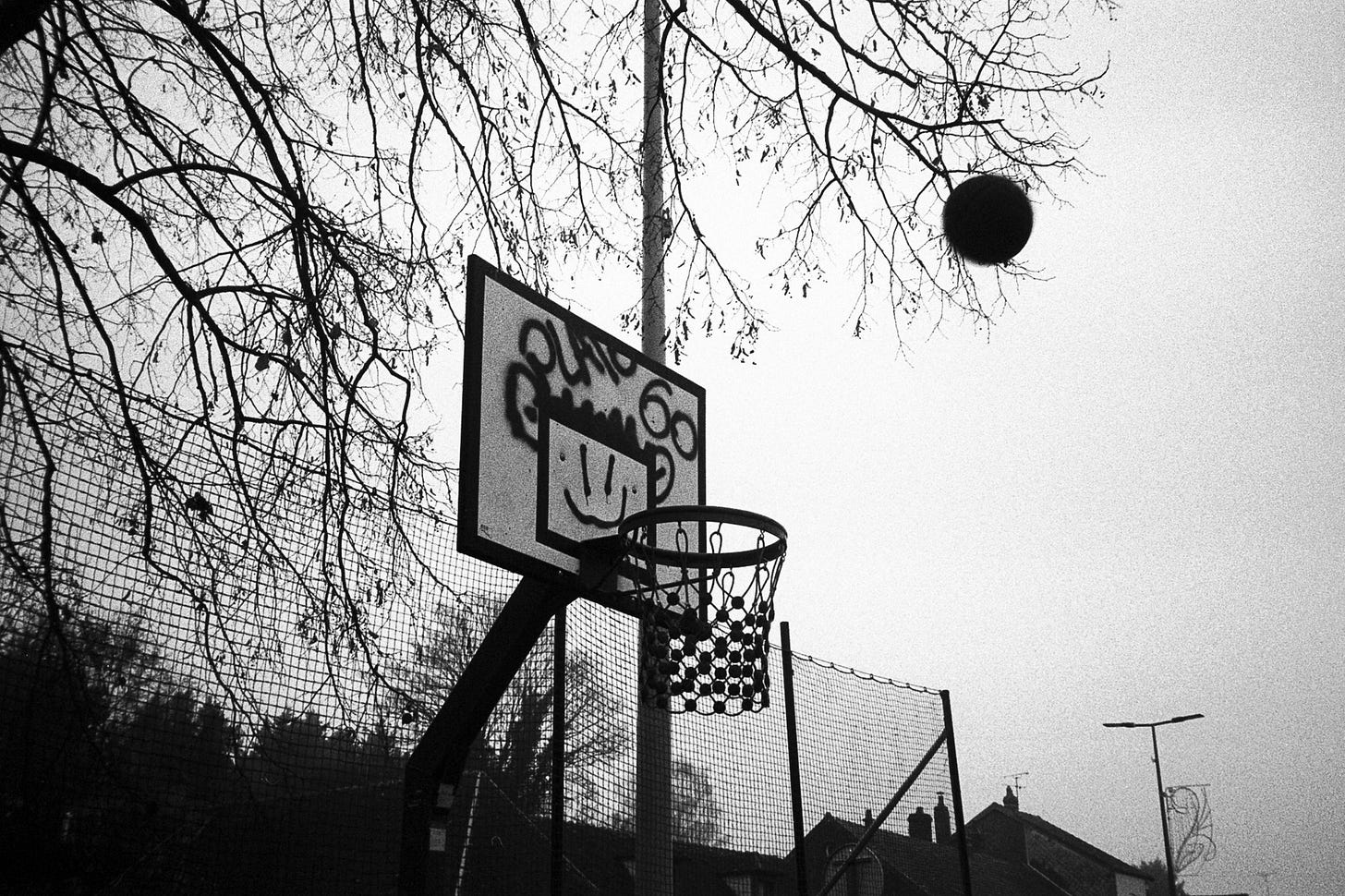 May be a black-and-white image of basketball