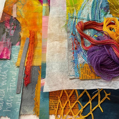 colourful fabric and fabric scraps with bundles of threads on top