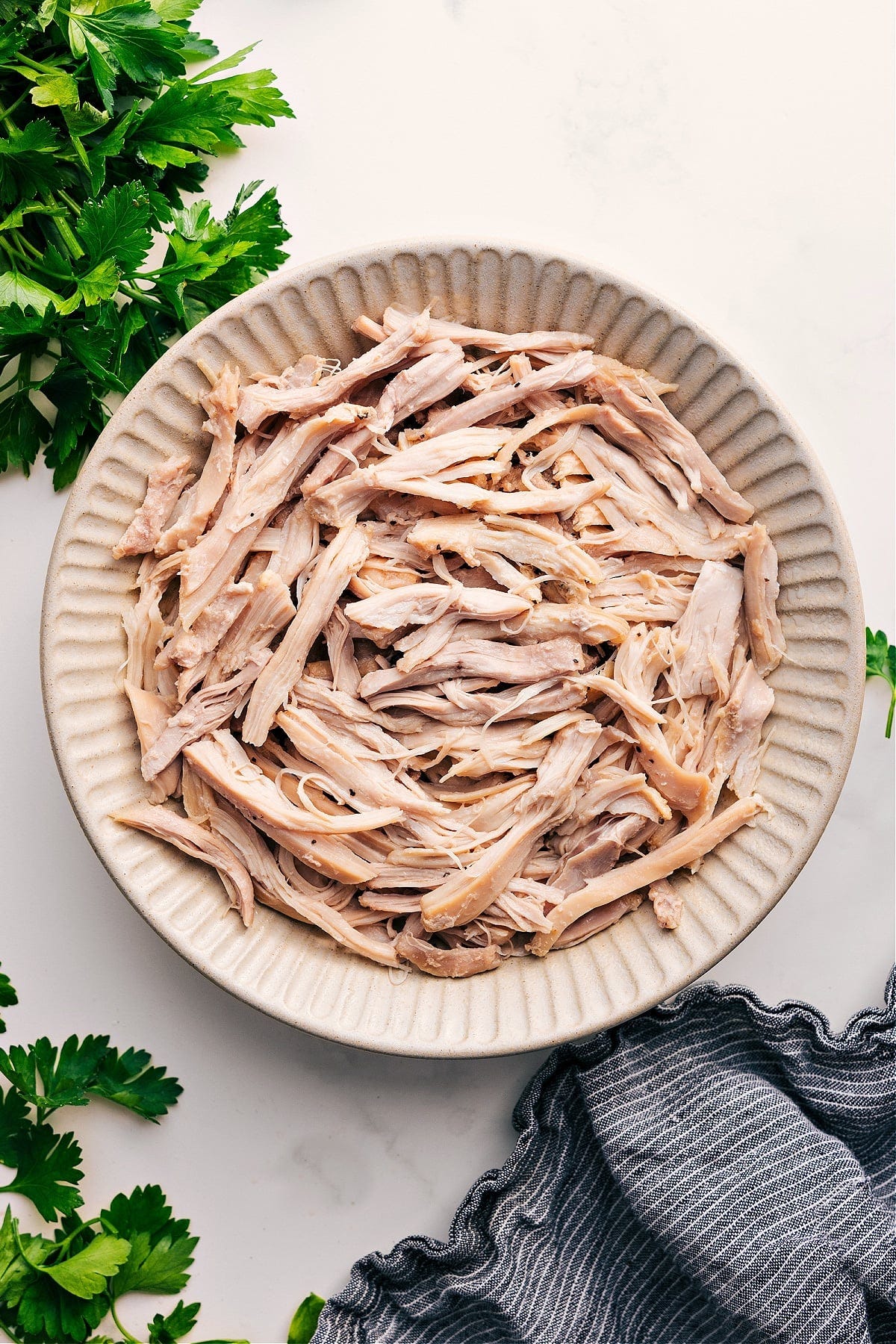 Shredded Chicken Recipes in a bowl ready to be enjoyed or used in another dish.