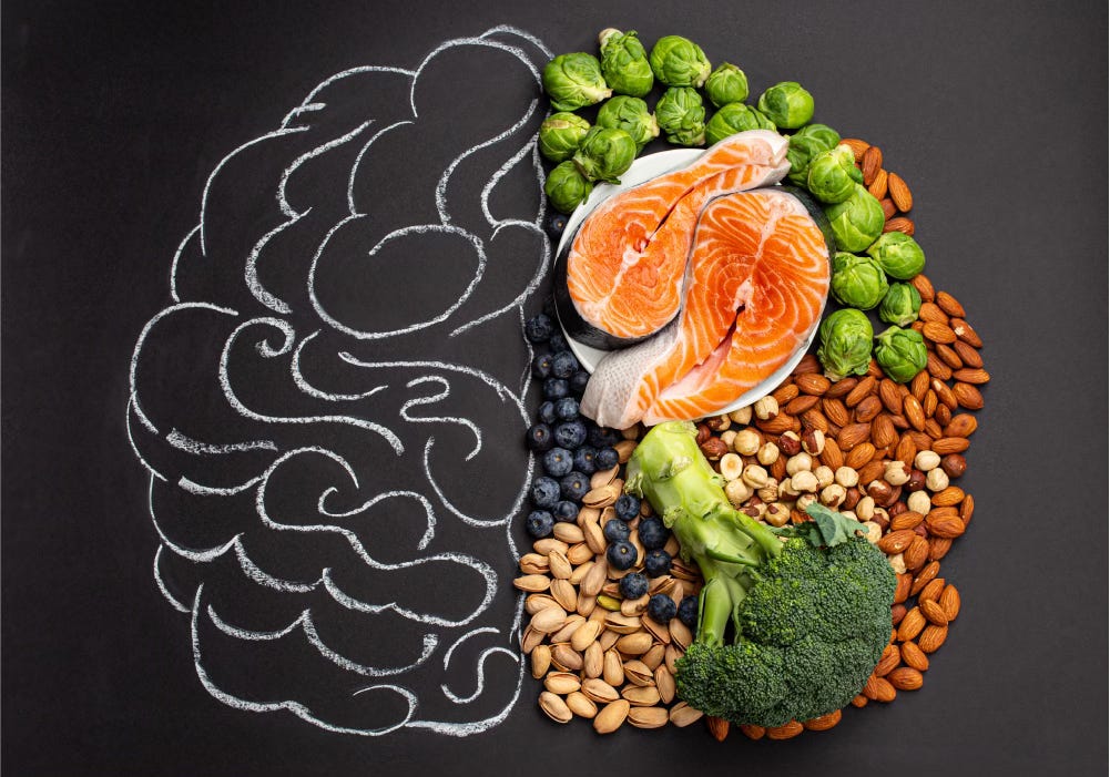 Chalk‑drawn brain with whole foods on a blackboard—ideal mood‑boosting, educational vibe.