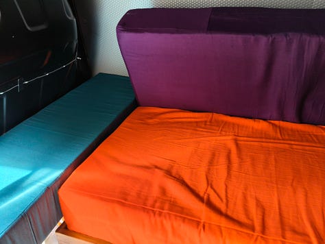 Campervan bed frame, foam mattresses cut and stuck together and fabric mattress covers