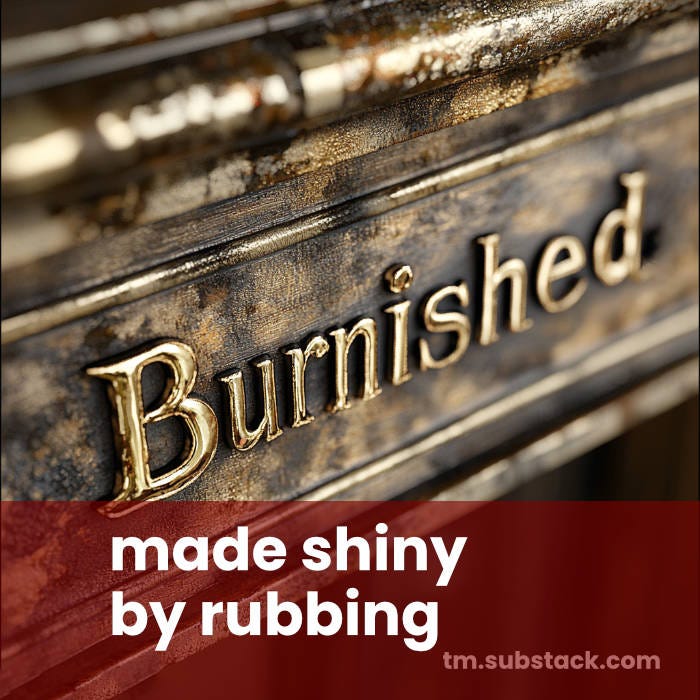 The SAT word 'burnished' illustrated with shiny metal letters.