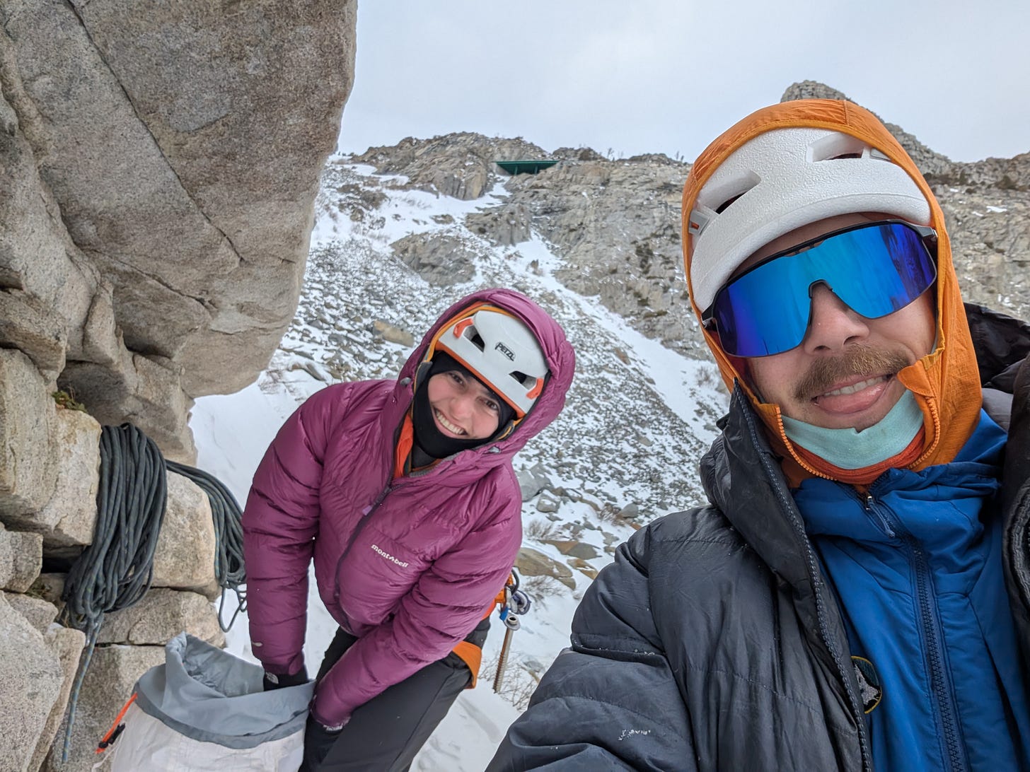 Mountain Guide takes client ice Climbing.