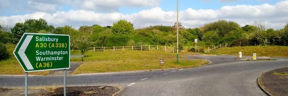 A road with a sign on it
AI-generated content may be incorrect. A road with a sign on it
AI-generated content may be incorrect.