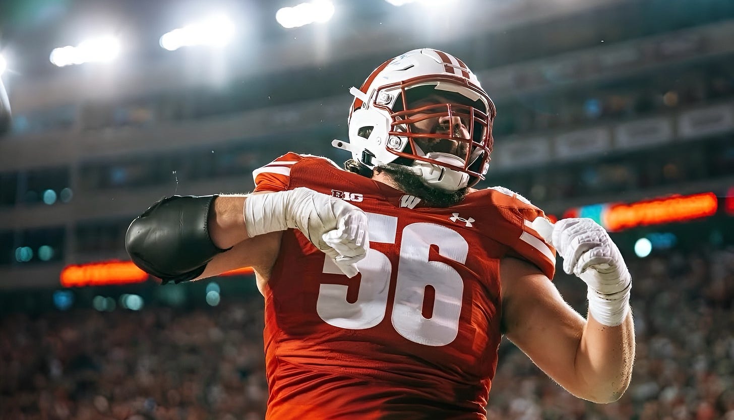 Wisconsin Badgers offensive lineman Joe Brunner celebrates during a game at Camp Randall Stadium.