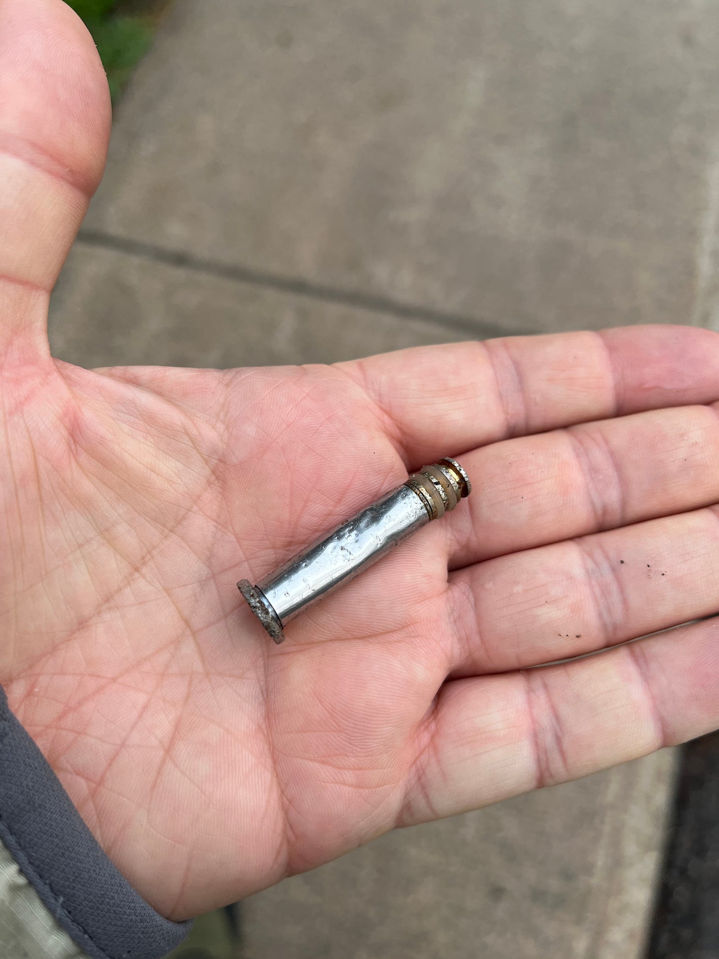 a small metal object, shaped like a pin for securing a small load a small metal object, shaped like a pin for securing a small load