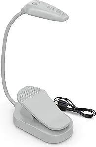 a white desk lamp with a white light on it