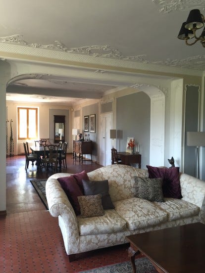 villa magnolia partial living room towards dining room villa magnolia partial living room towards dining room