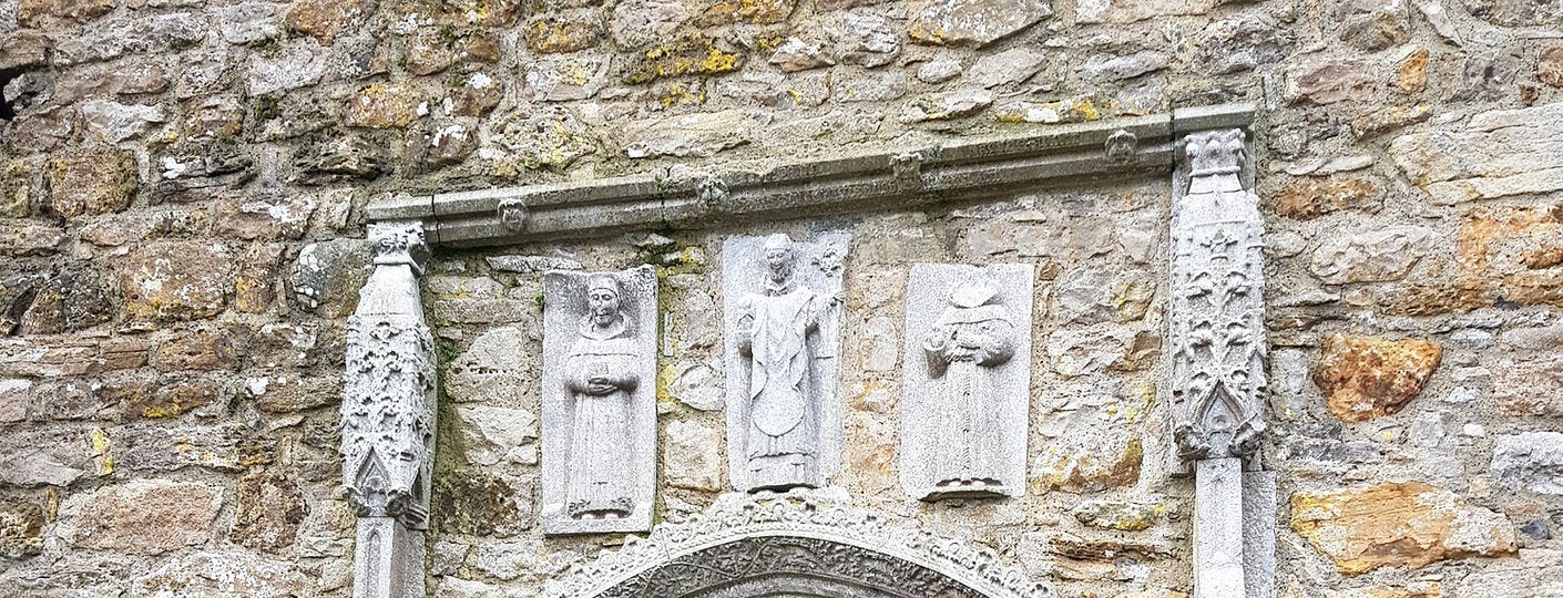 A close up view of the decorations of the top of the whispering doorway