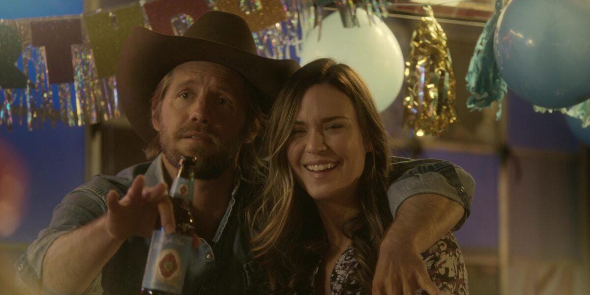 Walker Hoyt with arm around Emily and gift of boar head Walker Hoyt with arm around Emily and gift of boar head