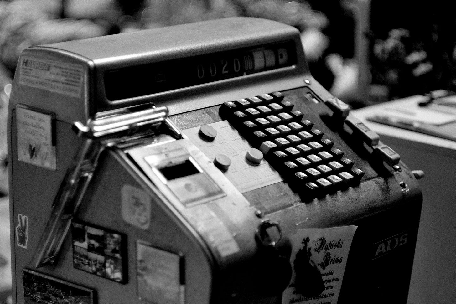 a black and white photo of a machine a black and white photo of a machine