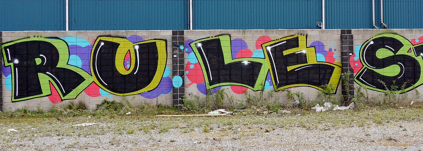 Graffiti reading "RULES" Graffiti reading "RULES"