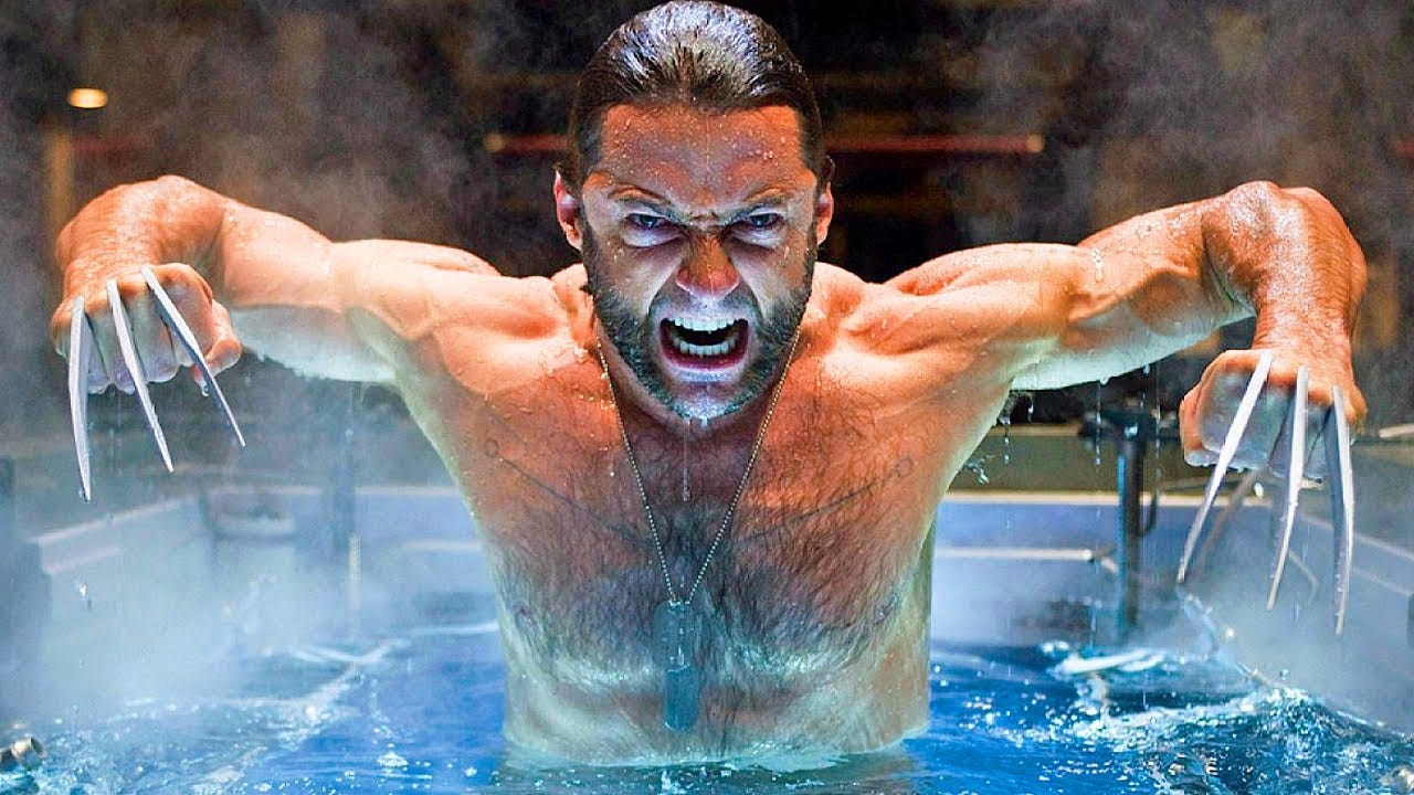 A shirtless Wolverine emerges roaring from a water tank, his metal claws extended and steam rising around him. A shirtless Wolverine emerges roaring from a water tank, his metal claws extended and steam rising around him.