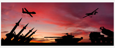 Photo of military vehicles at sunset