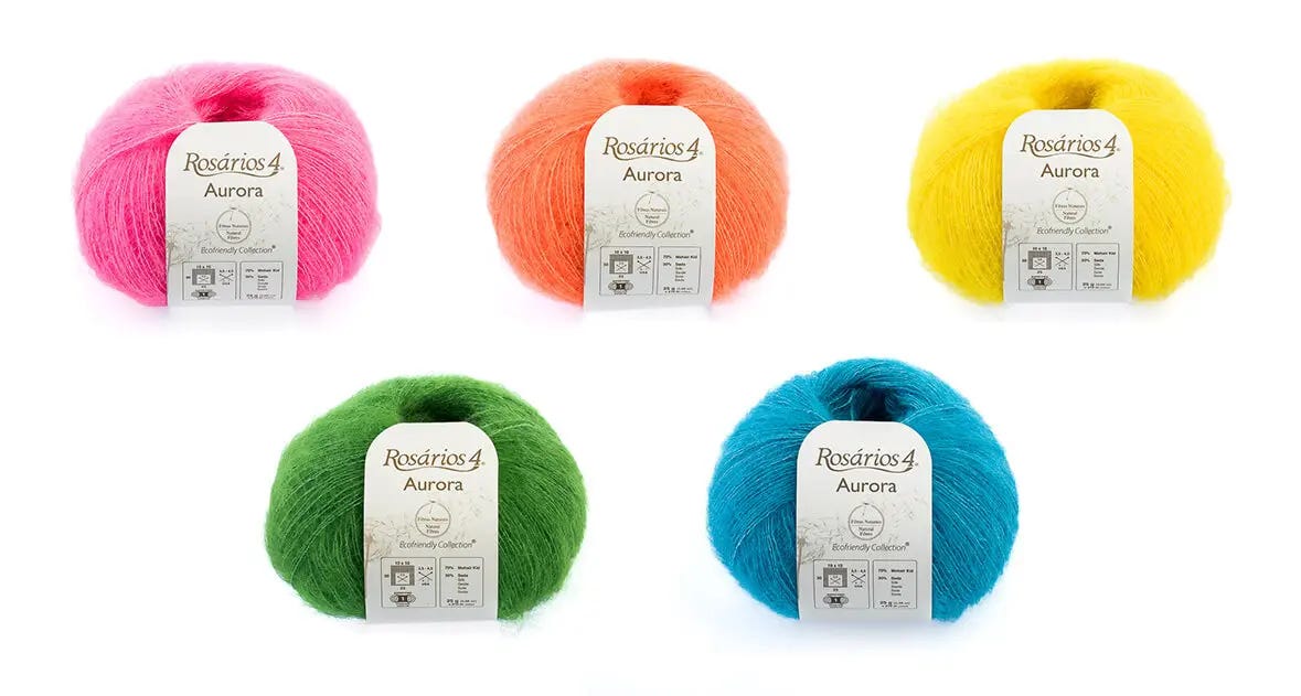 Five yarn skeins in neon colors, clockwise from top left: pink, orange, yellow, blue and green.