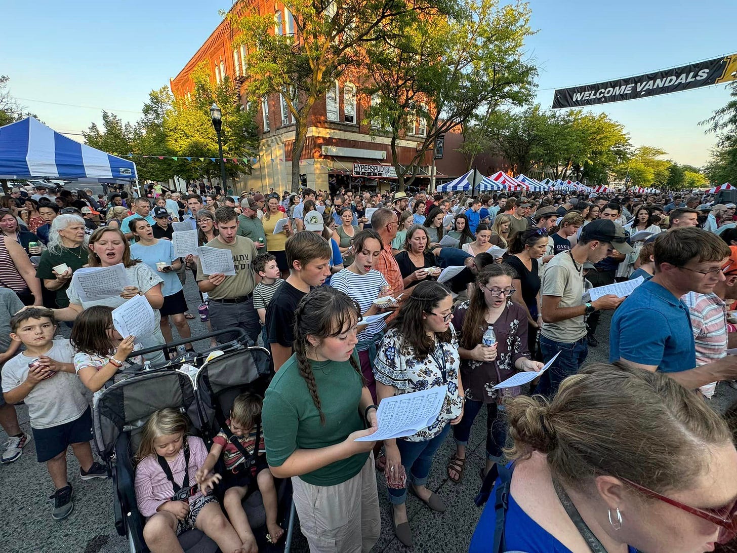 May be an image of 1 person and crowd