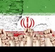 Raised fists of men against the background of the flag of ...