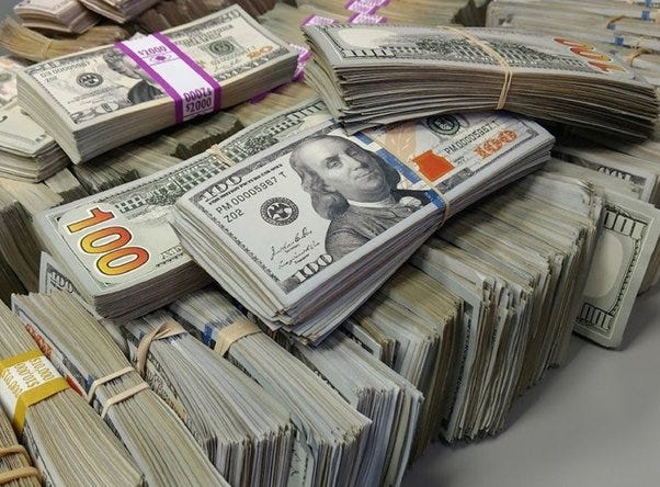Are the money stacks flaunted in music videos real? - Quora