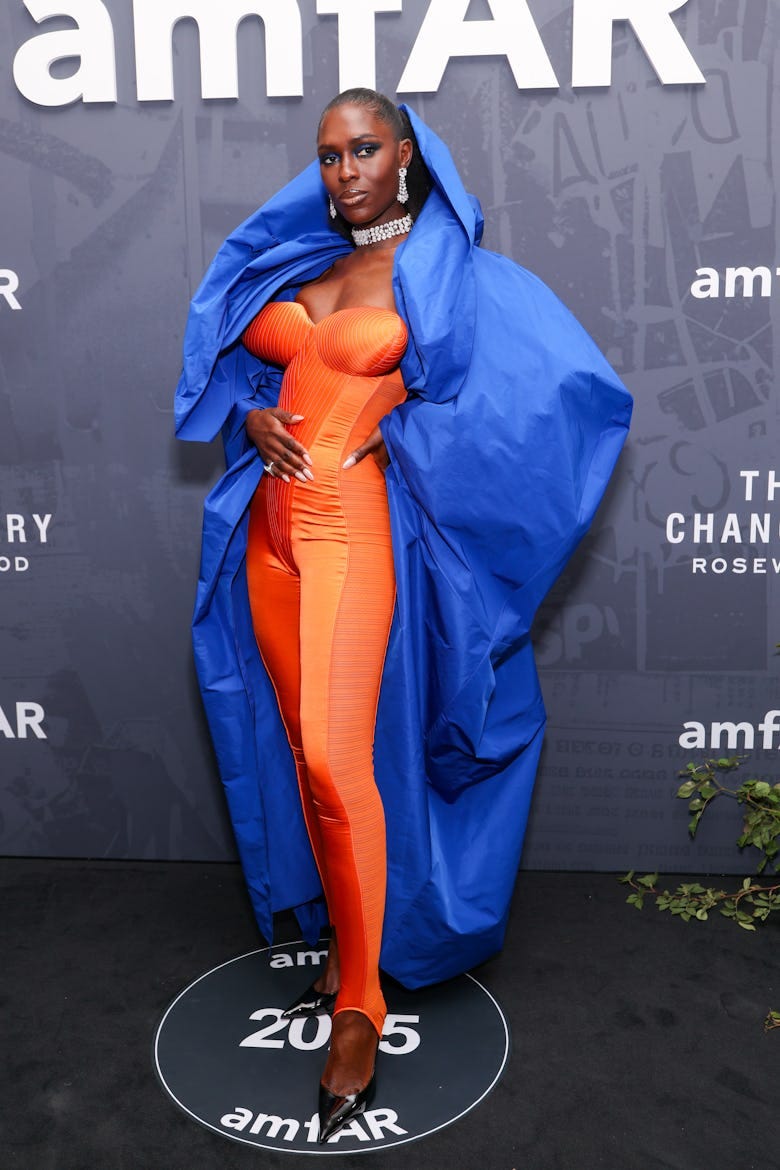Jodie Turner-Smith Makes the Cone Bra Subversive Again With a Bright Orange  Bodysuit