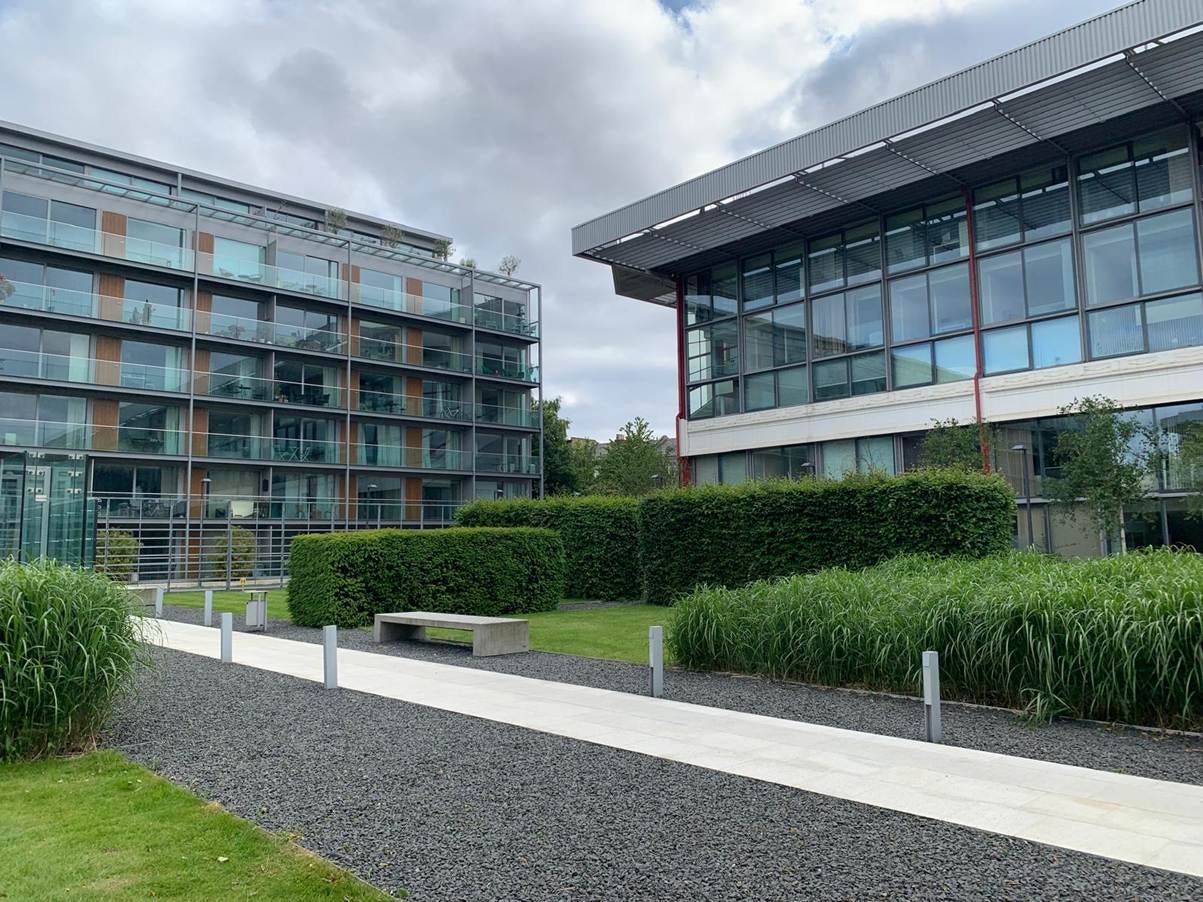 A building with a walkway and bushes
AI-generated content may be incorrect. A building with a walkway and bushes
AI-generated content may be incorrect.