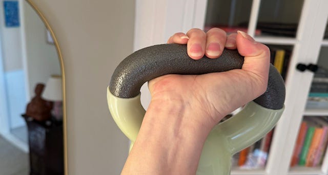 fist holding kettlebell