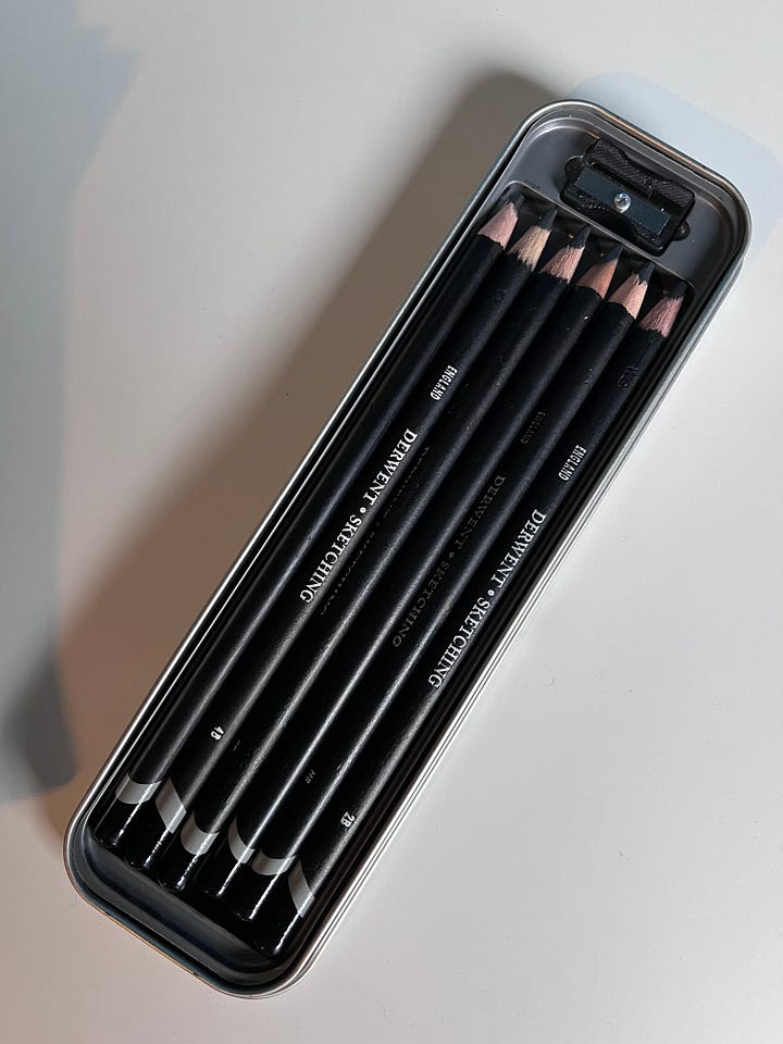 Derwent black sketching pencils and a rough drawing of James' artist inventory