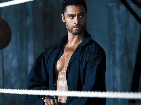 GIF of the Duke of Hastings partially-shirtless, doing up his shirt cuffs.