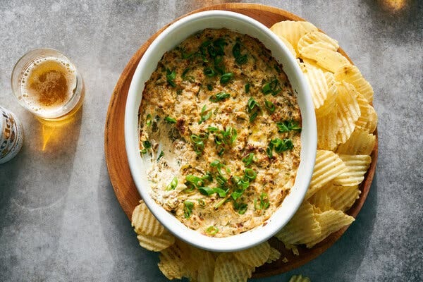 Potato chips are just the right kind of salty pairing for this dip. Potato chips are just the right kind of salty pairing for this dip.