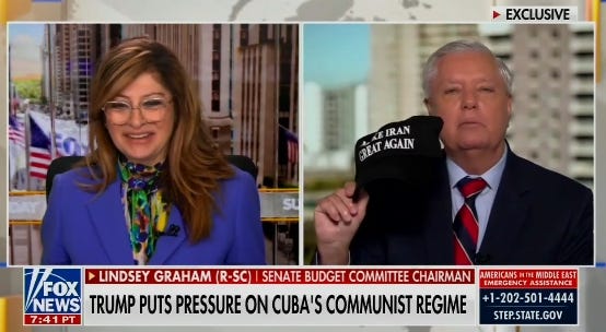 Lindsey Graham showing off some MAGA Nazi merch.