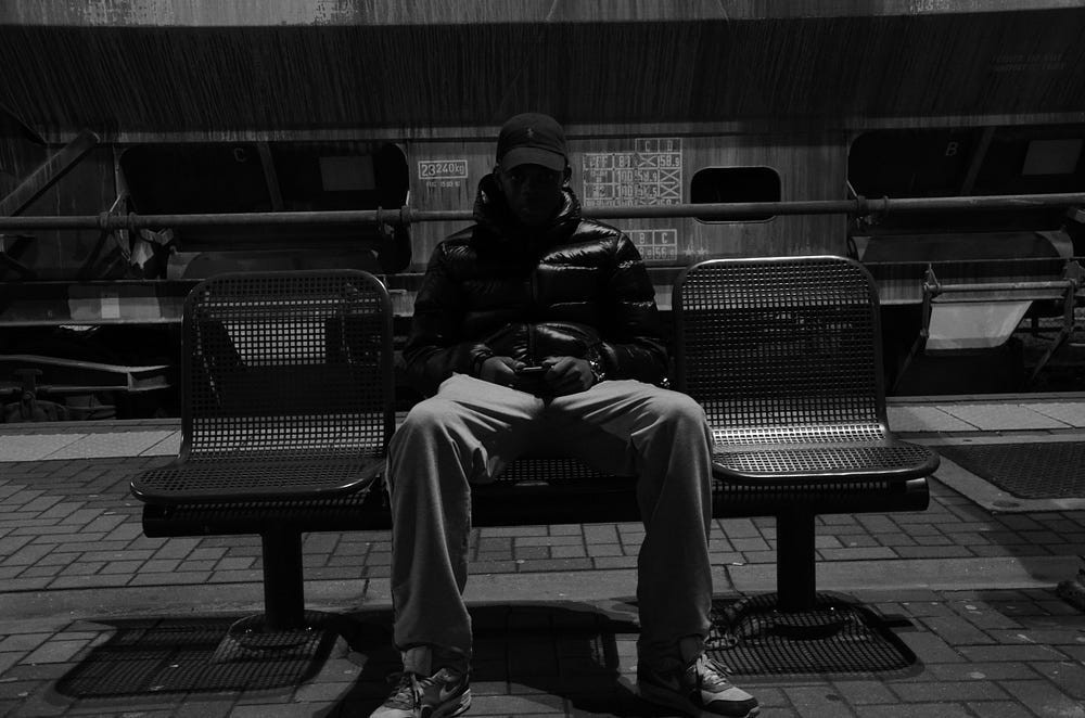 A lone shadowy figure in a ballcap on a steel bench alone Photo by Katleen Vanacker on Unsplash A lone shadowy figure in a ballcap on a steel bench alone Photo by Katleen Vanacker on Unsplash