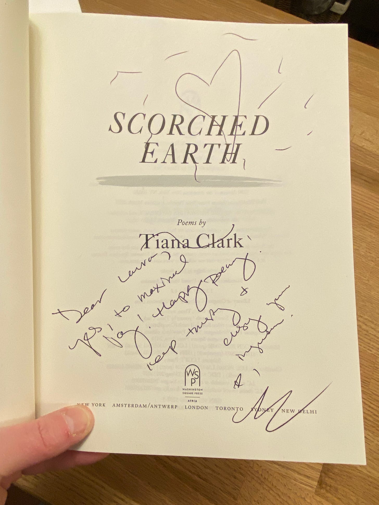 The title page of Scorched Earth, signed up Tiana Clark, with a heart and a note that says: Dear Laura, yes to maximal joy!